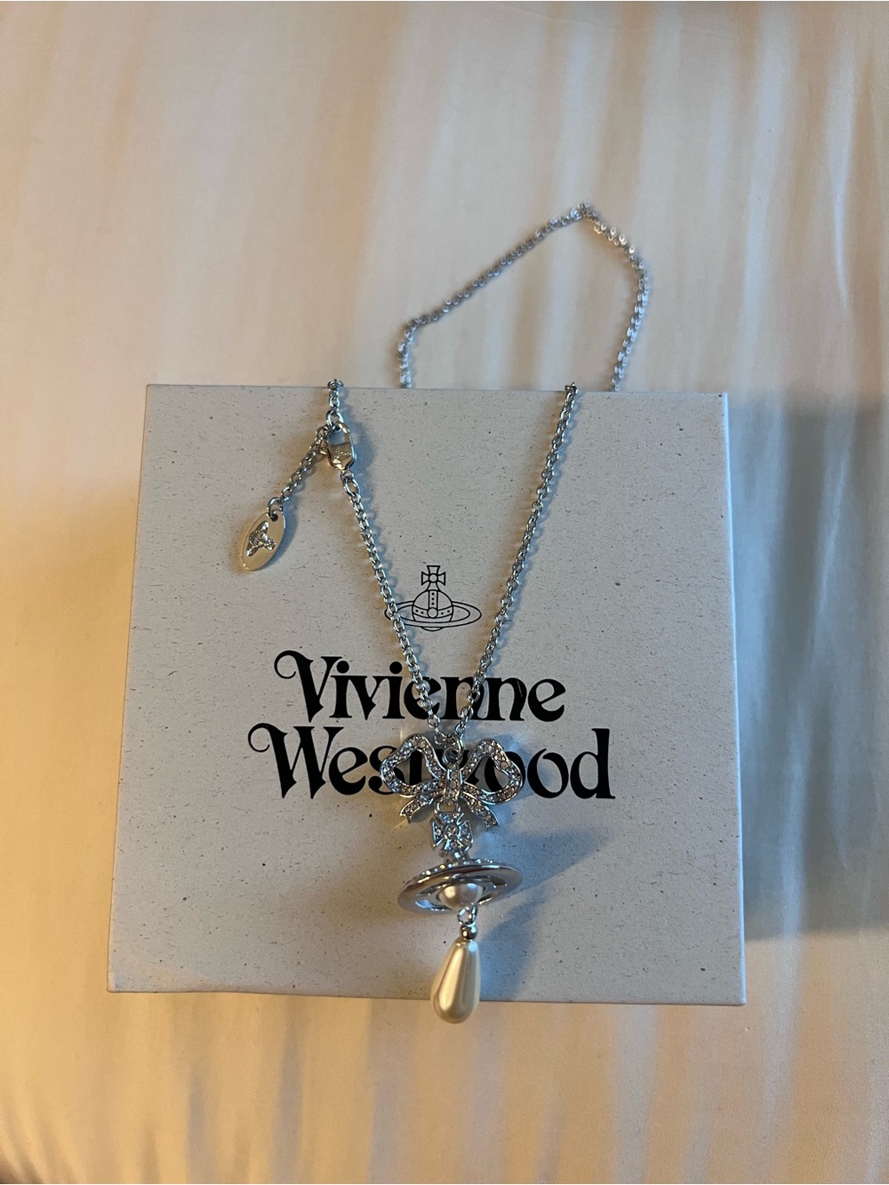 Vivienne Westwood Octavie Silver Bow Orb Pendant Necklace with Teardrop Charm